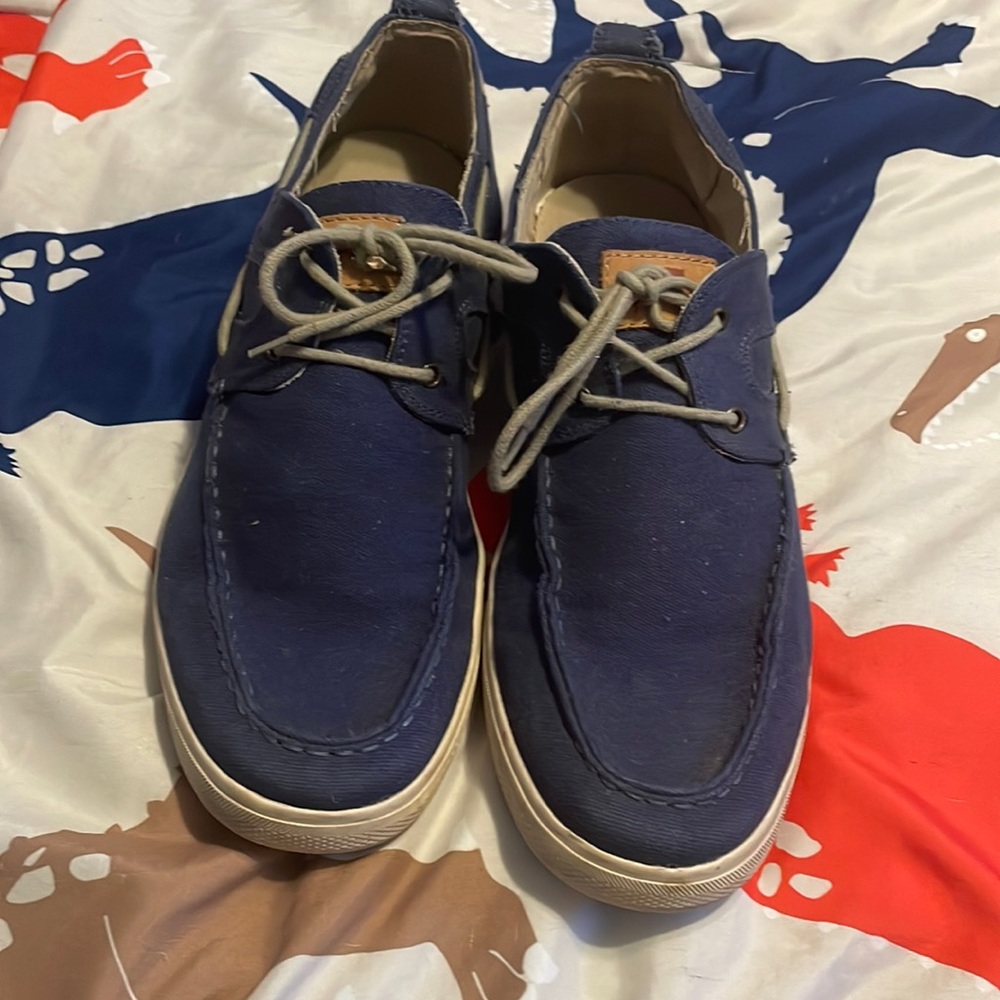 Tommy Bahamas classic canvas deck shoe.  From the docks to dinner out